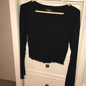 Black long sleeve with ruffle trim